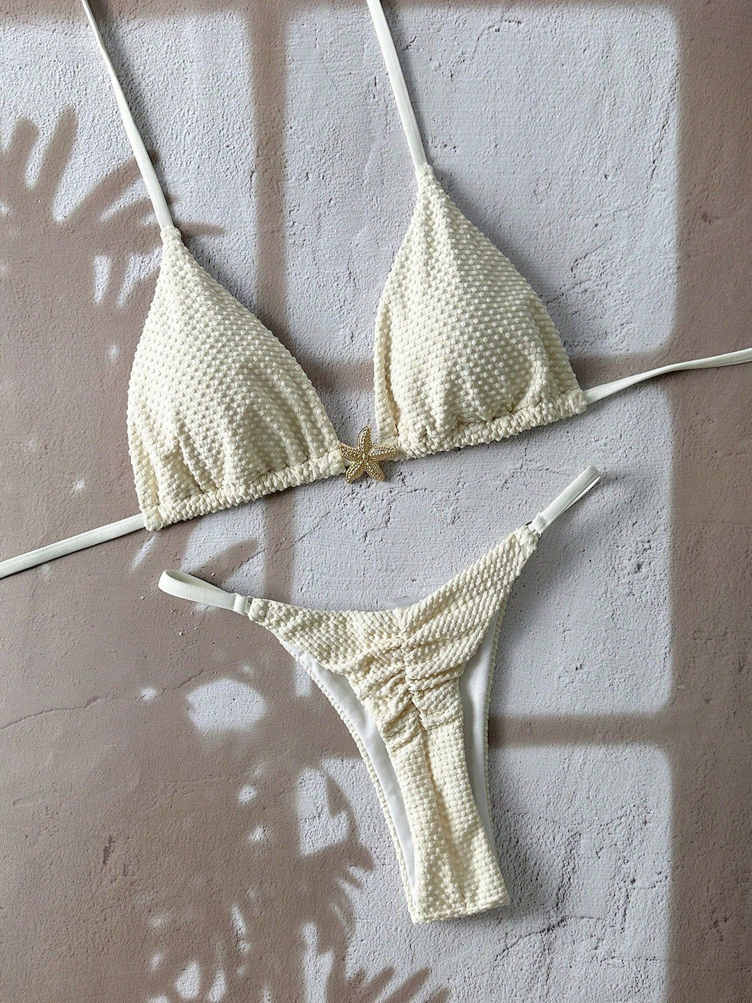Women's triangle bikini with textured fabric and maritime details Mune Fashion