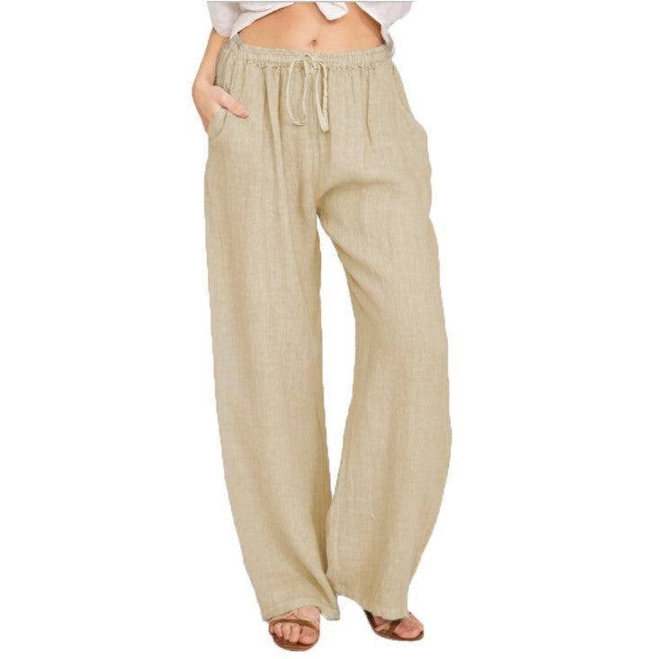 Women's airy palazzo pants with drawstring waistband, elastic waist finish, and side pockets Mune Fashion