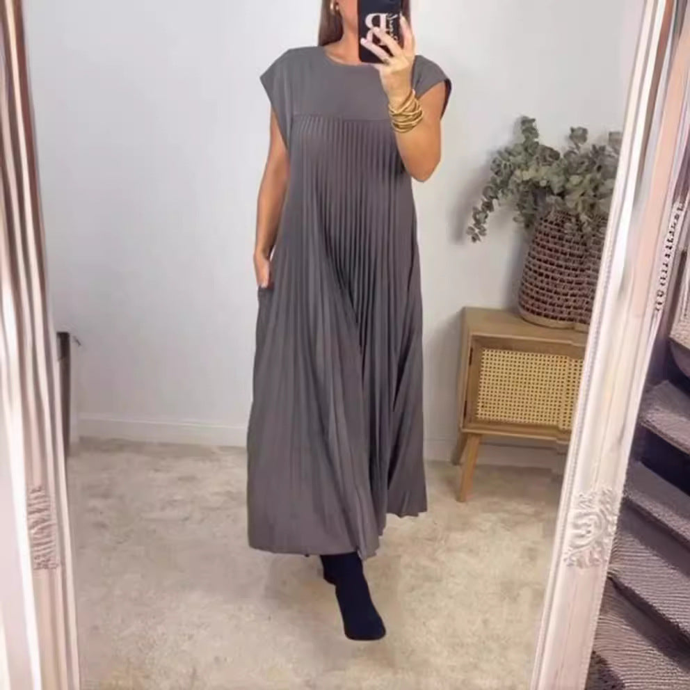 Women's flowing pleated maxi dress with dropped shoulders and side pockets Mune Fashion