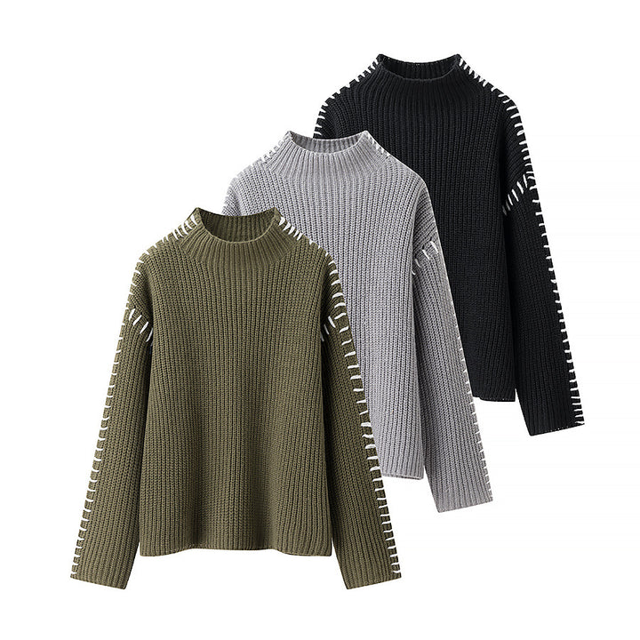 Women's chunky knit oversized sweater with high roll neck edge and decorative stitch sleeves Mune Fashion