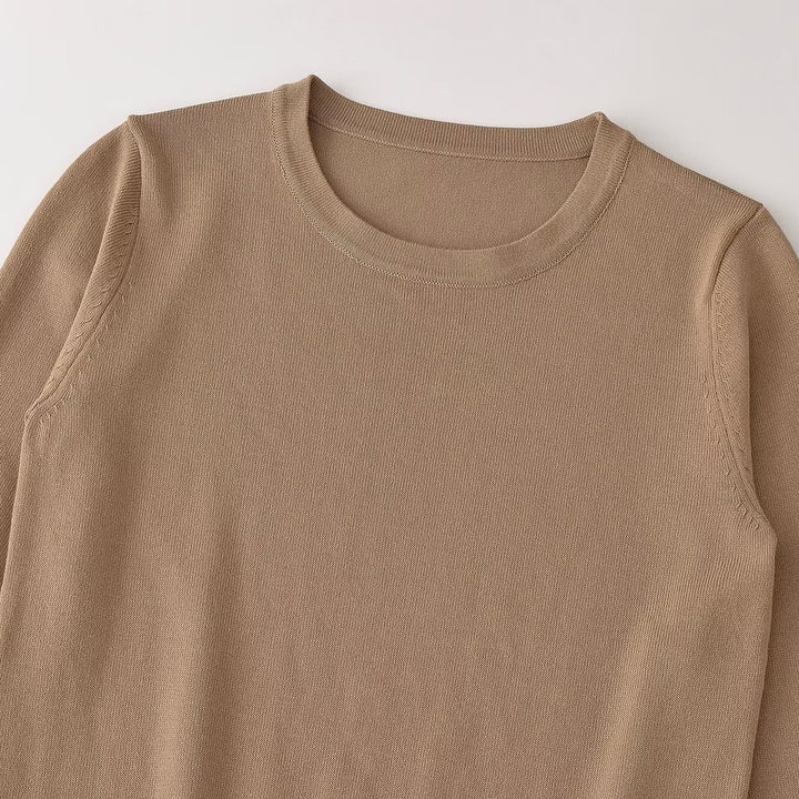 Women's fine knit pullover with stripe pattern, round neckline and decorative button detail Mune Fashion