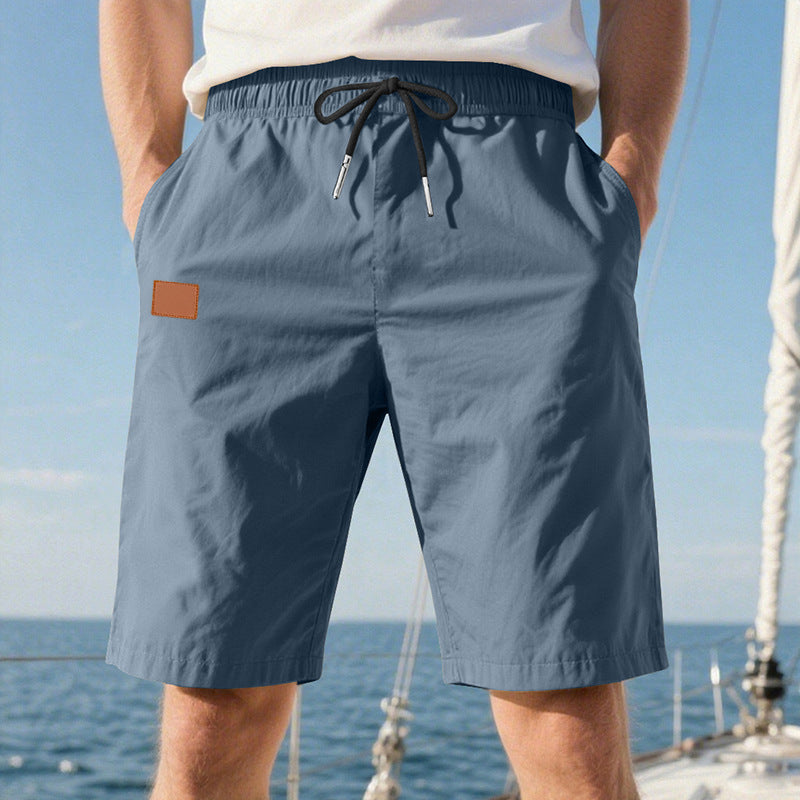 Men's quick-drying swim shorts in Bermuda cut with elastic waistband and drawstring Mune Fashion