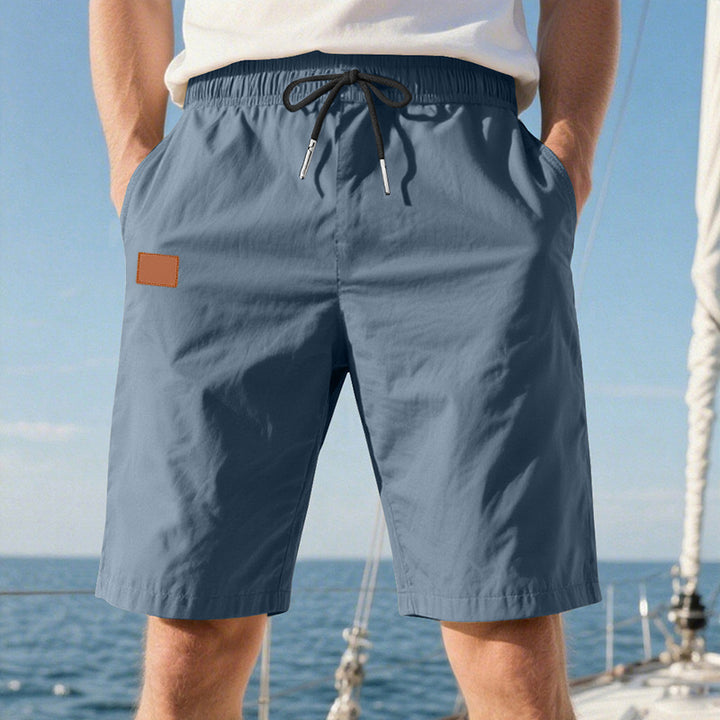 Men's quick-drying swim shorts in Bermuda cut with elastic waistband and drawstring Mune Fashion