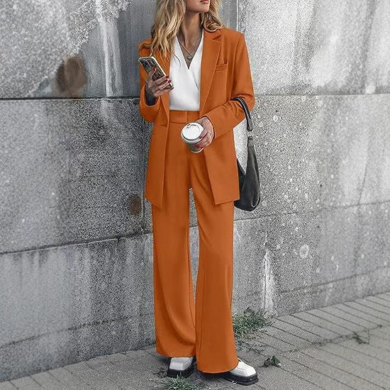 Women Long Blazer Set with boxy oversized silhouette, structured shoulder area and high-waisted palazzo pants Mune Fashion