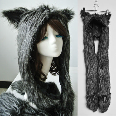 Ladies hooded stole made of luxurious faux fur with long scarf tails and pompom ends Mune Fashion