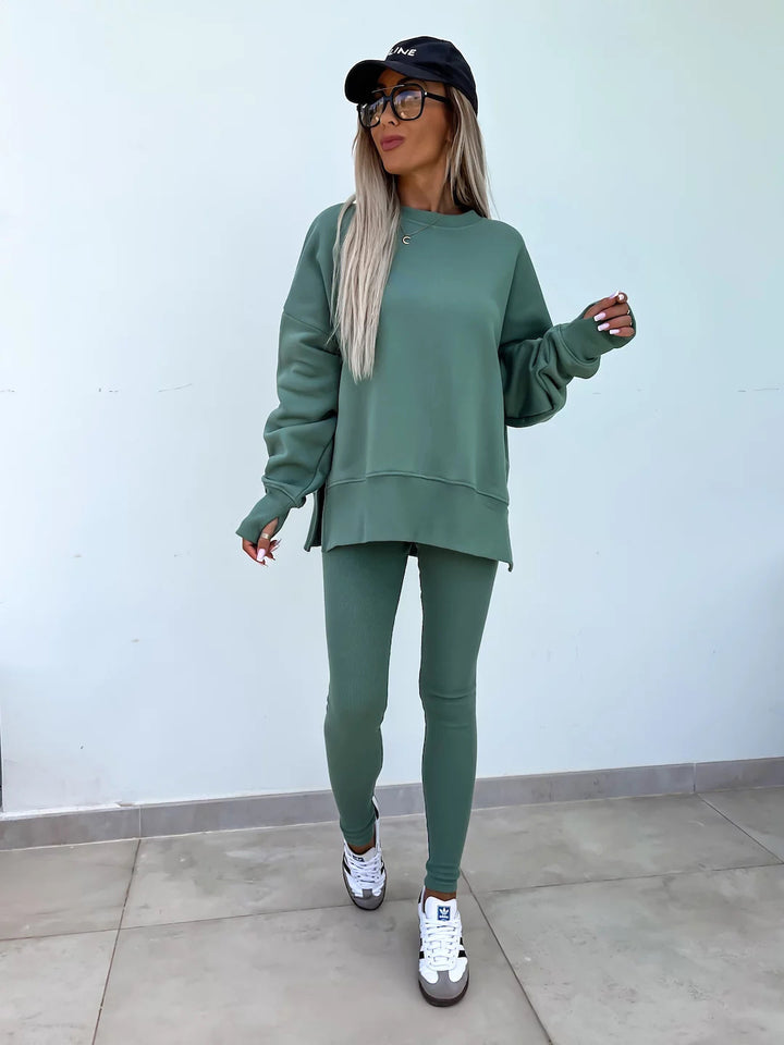 Women comfortable oversized lounge set with long sweatshirt, ribbed high-waist leggings and extended cuffs Mune Fashion