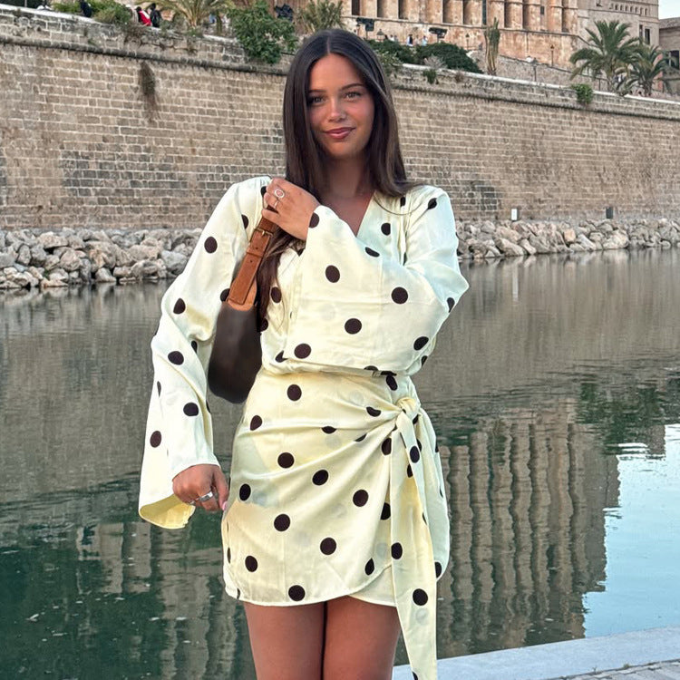 Ladies wrap mini dress with V-neck, bell sleeves and polka dot print Mune Fashion