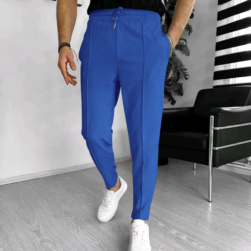 Men's tapered jogging chinos made of structured woven quality with elastic drawstring waistband and decorative crease Mune Fashion