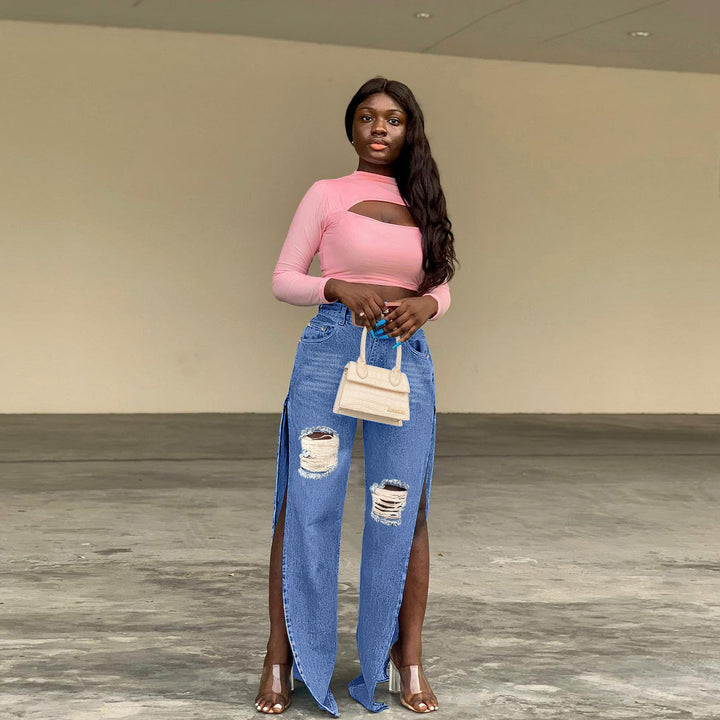 Ladies tapered denim jeans with high side slits and destroyed knee area Mune Fashion