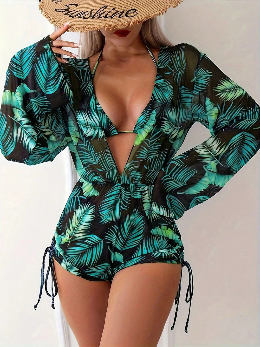 Women's swimsuit with elegant V-neckline and playful palm print Mune Fashion