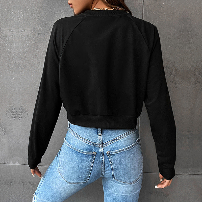 Women's cropped sweatshirt with heart print, round neckline and ribbed cuffs Mune Fashion