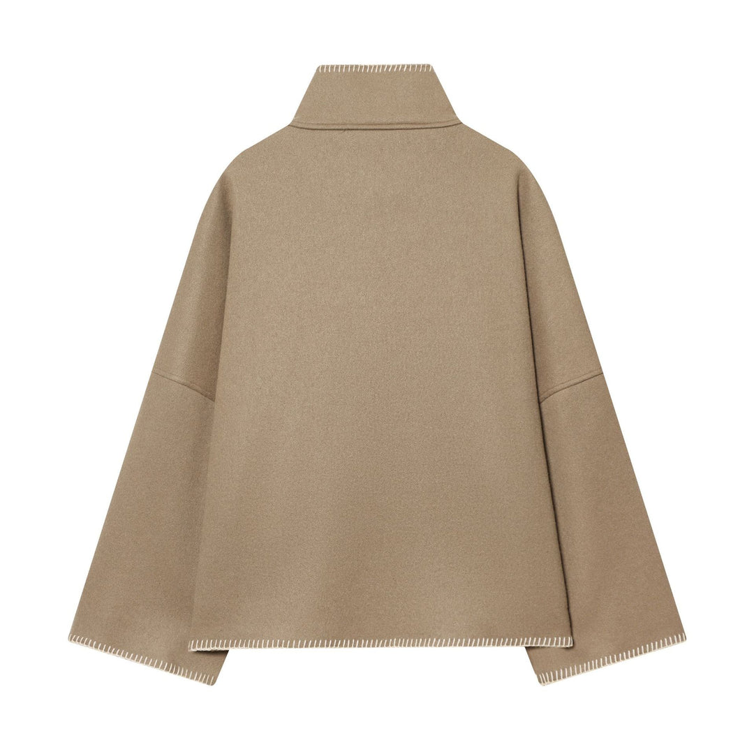 Women's cozy wool cape with high stand-up collar, asymmetrical button placket and decorative seam Mune Fashion