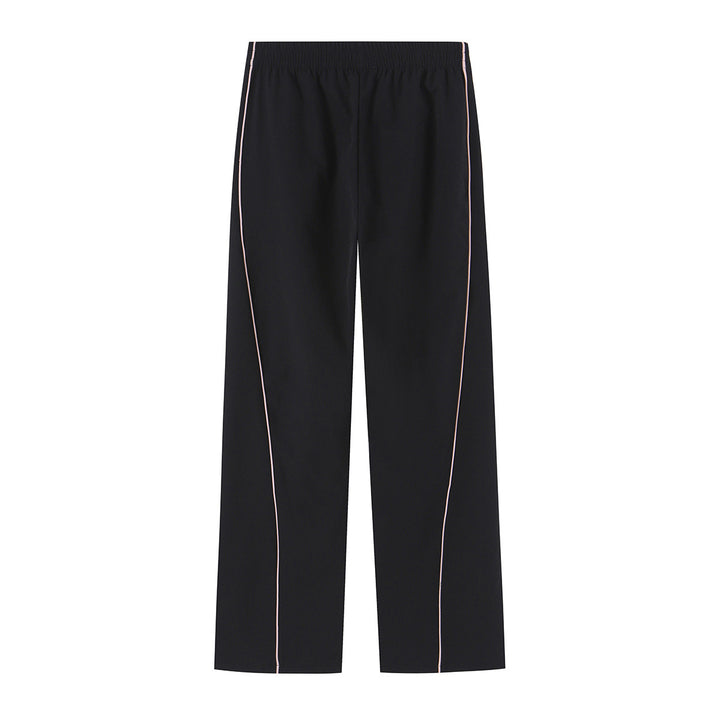 Women wide training pants with contrasting piping and elastic waistband Mune Fashion