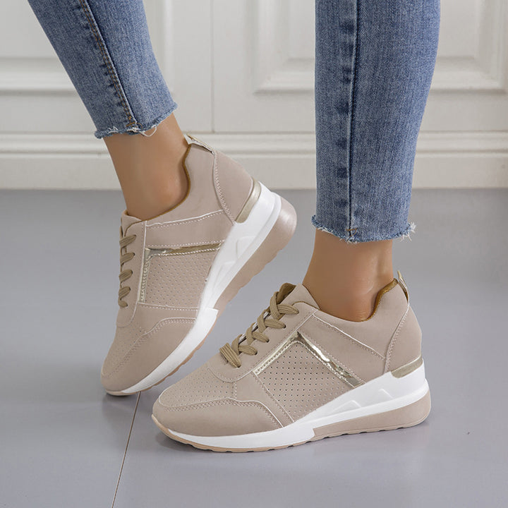 Women's sporty platform sneaker with perforated microfiber upper, cushioned comfort lining, and reflective decorative stripe Mune Fashion