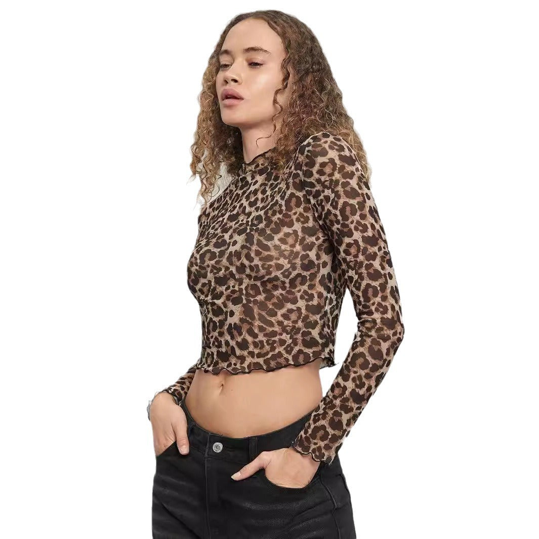 Ladies' figure-hugging cropped long-sleeve shirt in animal print made of fine stretch mesh with stand-up collar and wave hem Mune Fashion