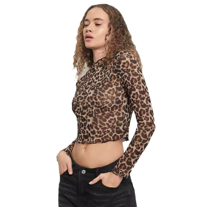 Ladies' figure-hugging cropped long-sleeve shirt in animal print made of fine stretch mesh with stand-up collar and wave hem Mune Fashion