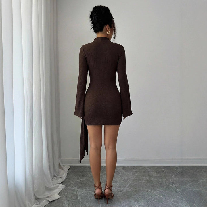 Women fitted knit mini dress with stand-up collar, trumpet sleeves and side draping with decorative ring Mune Fashion