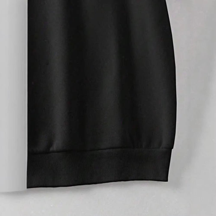 Women's Casual Oversized Sweatshirt with Vintage Skull Print and Ribbed Hem Mune Fashion