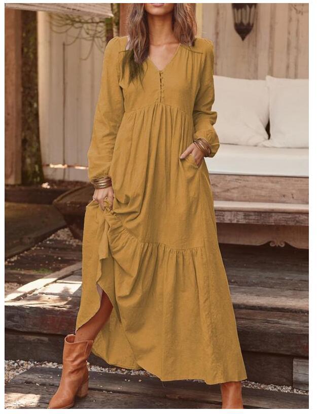 Women's airy maxi dress with V-neck, long sleeves, and inseam pockets Mune Fashion