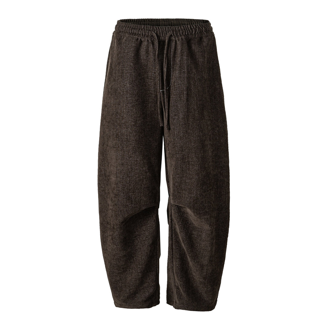 Women's loosely cut cropped pants with high elastic waistband and drawstring made of textured linen blend Mune Fashion