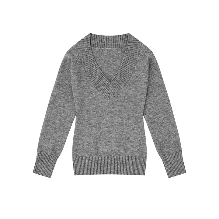 Women's fine knit pullover with deep V-neck, wide ribbed hem, and relaxed fit Mune Fashion
