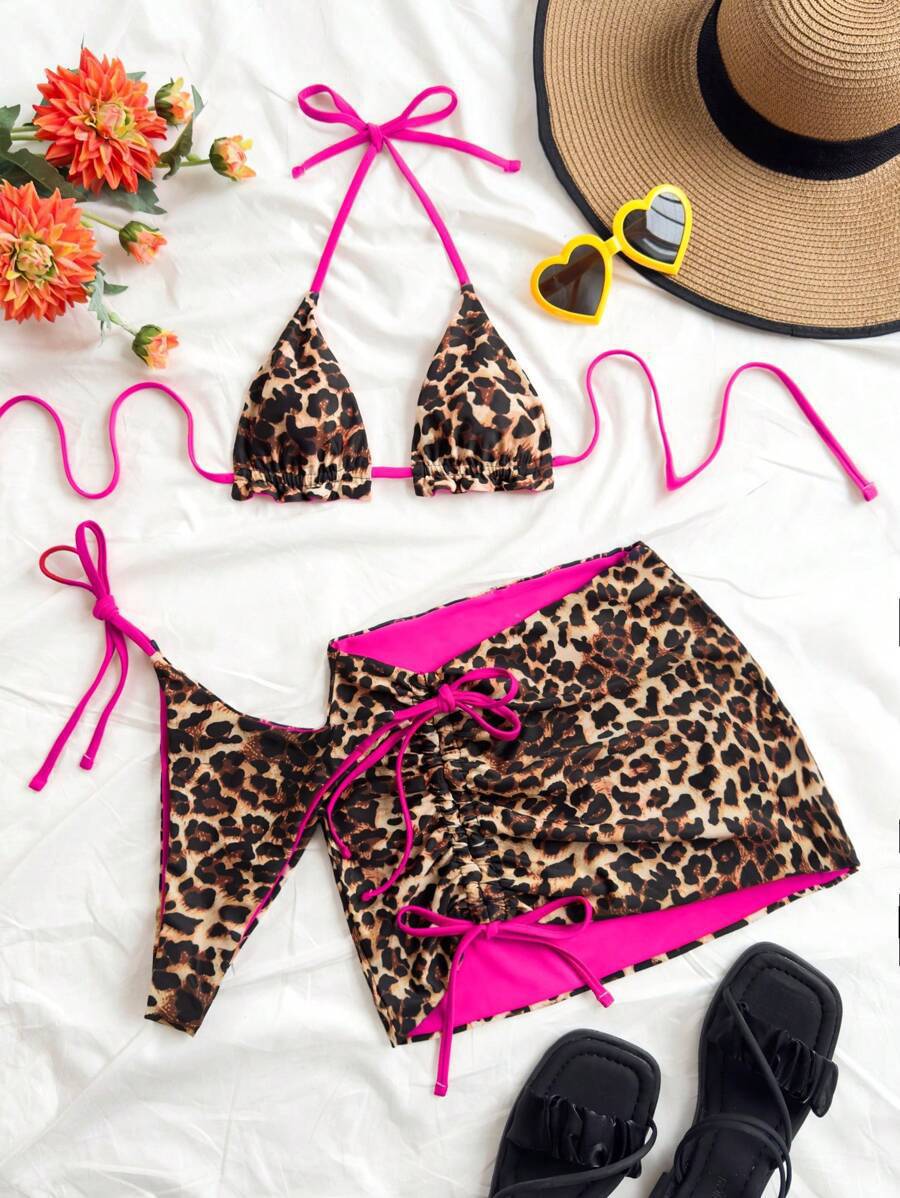 Women's triangle bikini set with ruffle-free details and wrap skirt Mune Fashion