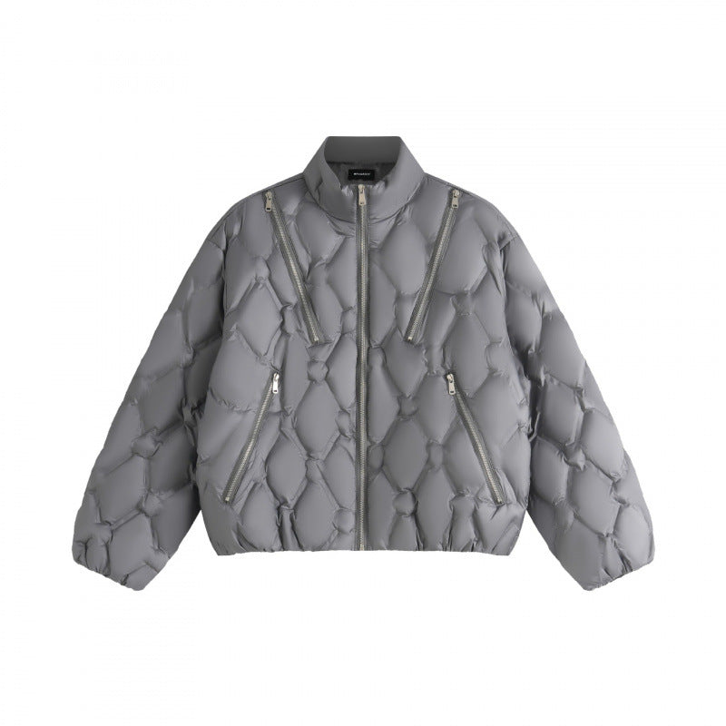 Unisex short cut quilted jacket in boxy cut with diamond quilting and diagonal zip pockets Mune Fashion