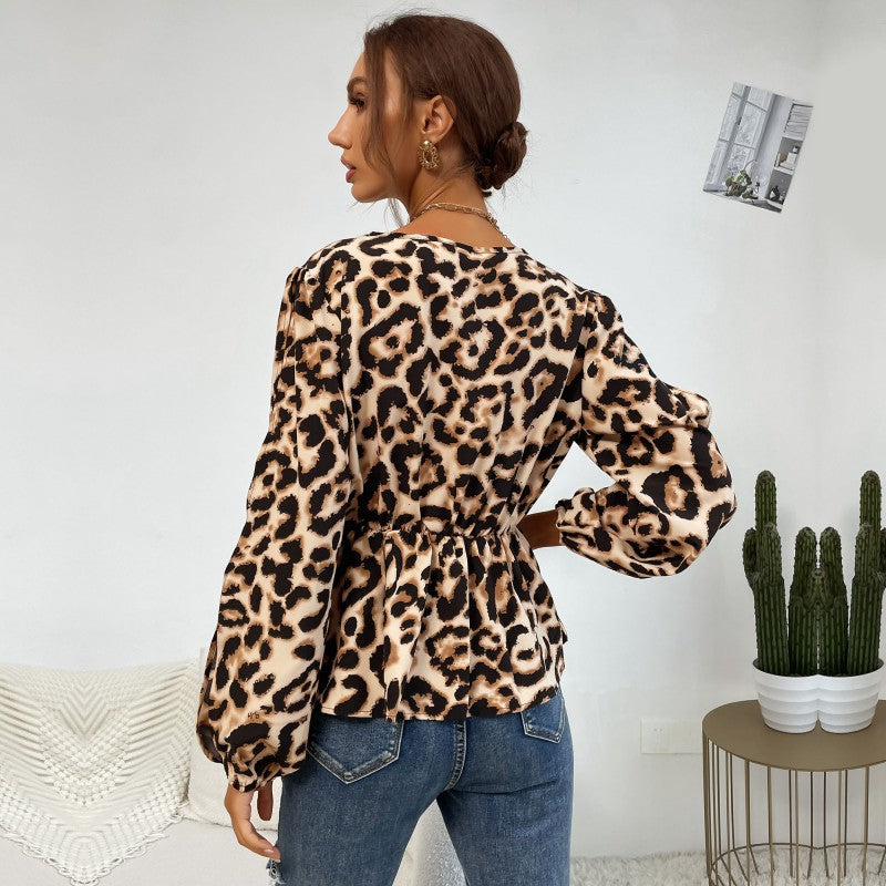 Women's satin blouse with wrap collar, elastic waist, and balloon sleeves Mune Fashion