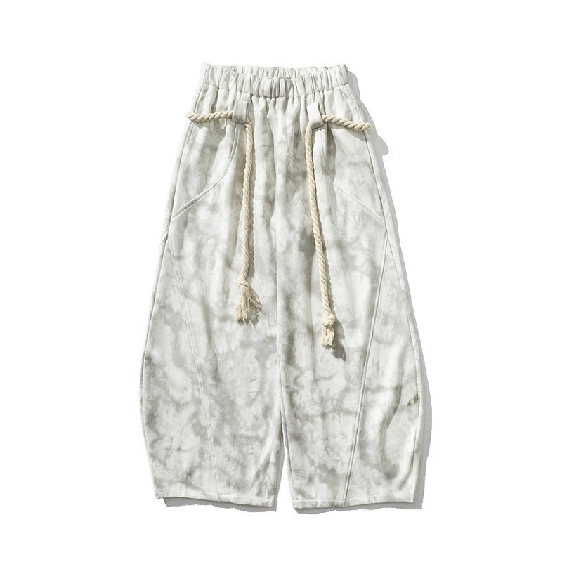 Unisex wide batik harem pants with decorative drawstring and deep crotch Mune Fashion