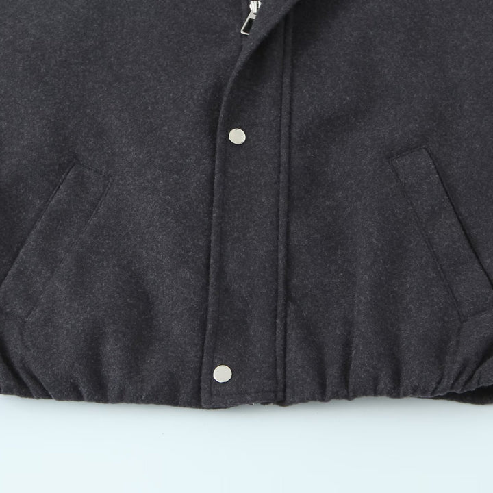 Women's short bomber-style jacket with stand-up collar, snap button placket, and elastic hem Mune Fashion