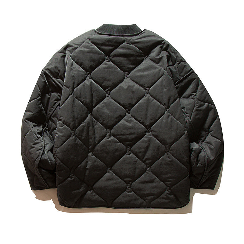 Unisex Lightweight Boxy Puffer Jacket with distinctive diamond quilting, front round pockets, and ribbed collar Mune Fashion