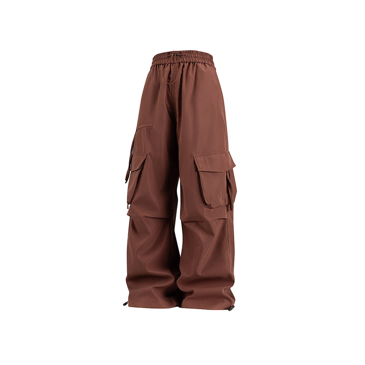 Damen Weite Cargo‑Hose im Baggy‑Cut mit elastischem Tunnelzugbund, Klapp‑Utility‑Taschen und verstellbarem Beinabschluss Mune Fashion