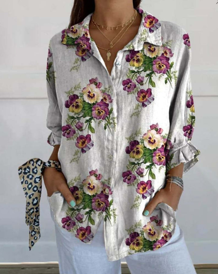 Women's lightweight linen-look shirt blouse with floral pattern, loose fit, roll-up sleeves, and patch pockets Mune Fashion