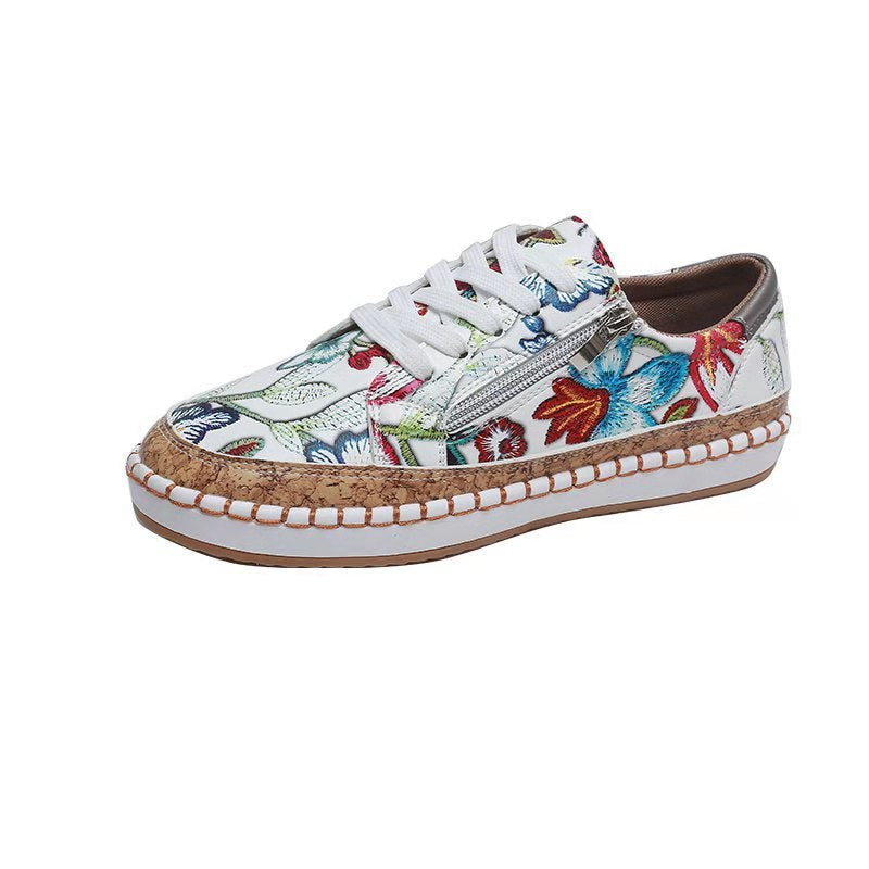 Women's floral platform sneaker with cork platform, side zipper and cushioned comfort insole Mune Fashion