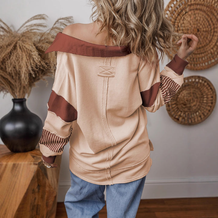 Women’s oversized sweatshirt with deep V-neck, striped inner collar and contrast sleeves Mune Fashion