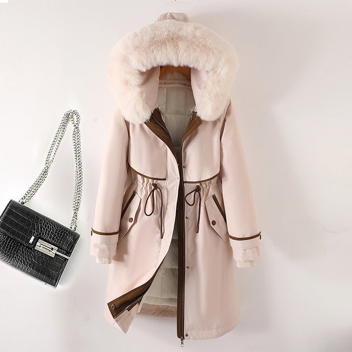 Women's long parka with faux fur hood, waist drawstring, and contrasting piping Mune Fashion