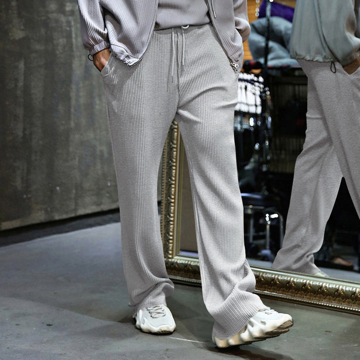 Men's loosely cut pleated trousers with drawstring and wide leg Mune Fashion
