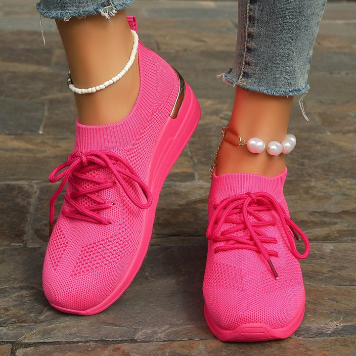 Women’s knit sneakers with wedge sole, sock-like shaft and metallic heel accent Mune Fashion