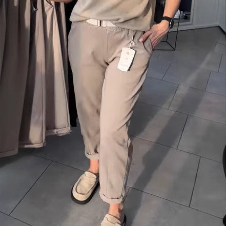 Women's casual cotton chinos with elastic comfort waistband, cuffs, and decorative belt Mune Fashion