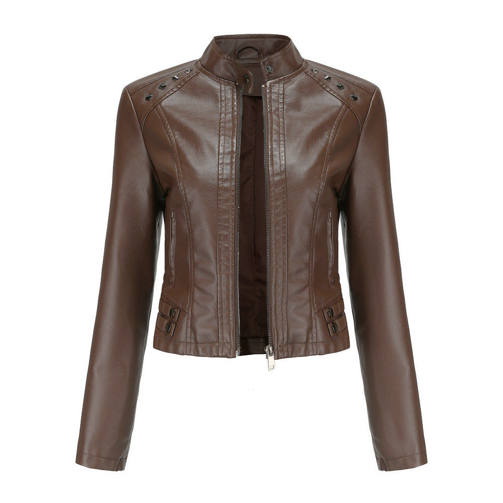 Women's short fitted faux leather jacket with studded detailing and stand-up collar Mune Fashion