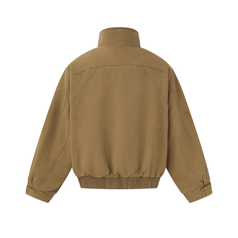 Men's short-cut canvas bomber jacket with high stand-up collar, concealed front placket, and zip pockets Mune Fashion
