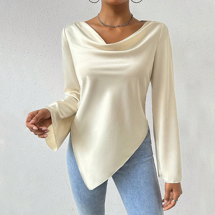 Women's blouse with waterfall neckline, wide trumpet sleeves and flowing satin look.
