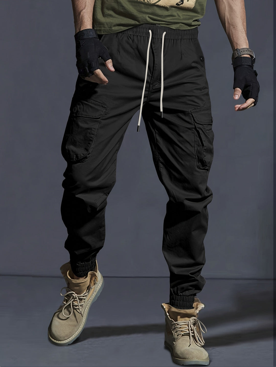 Men's cargo jogger pants with elastic waistband, drawstring, and multifunctional pockets.