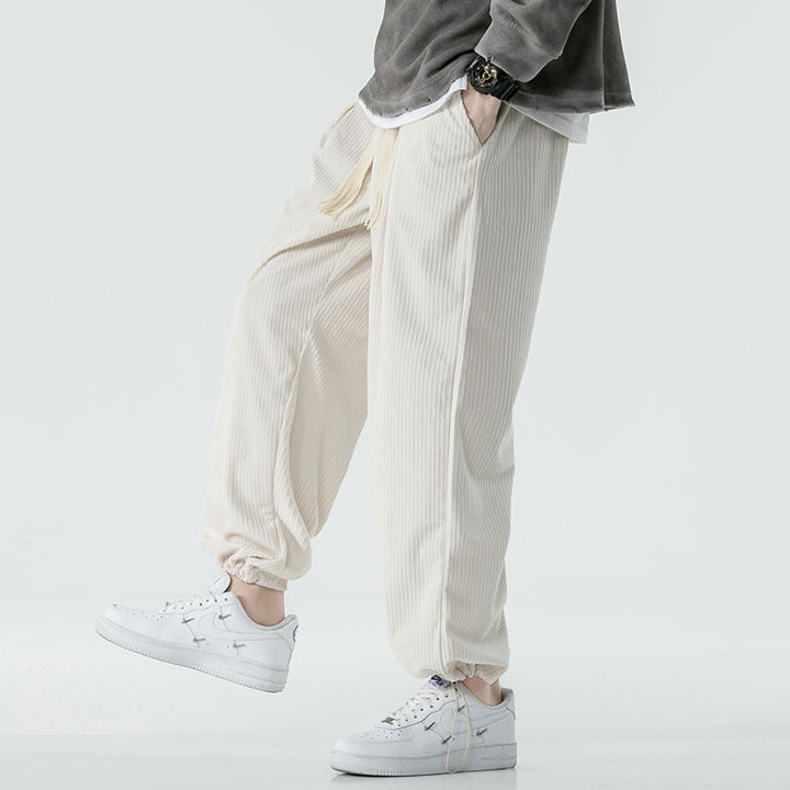 Men's loose-fitting corduroy pants with wide leg, elastic waistband and decorative drawstring Mune Fashion