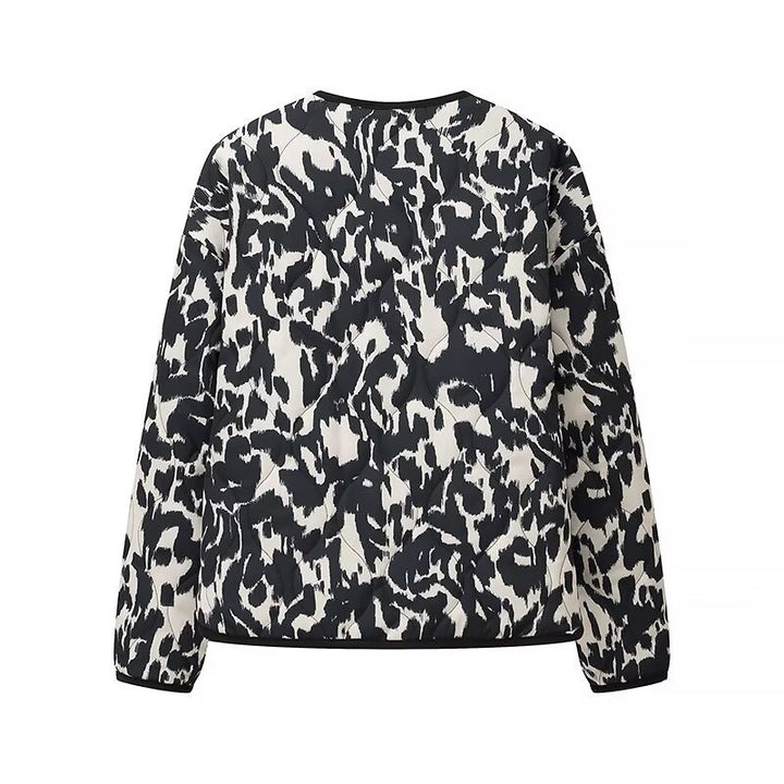 Women’s quilted jacket in oversized boxy cut with round neckline and abstract animal print Mune Fashion