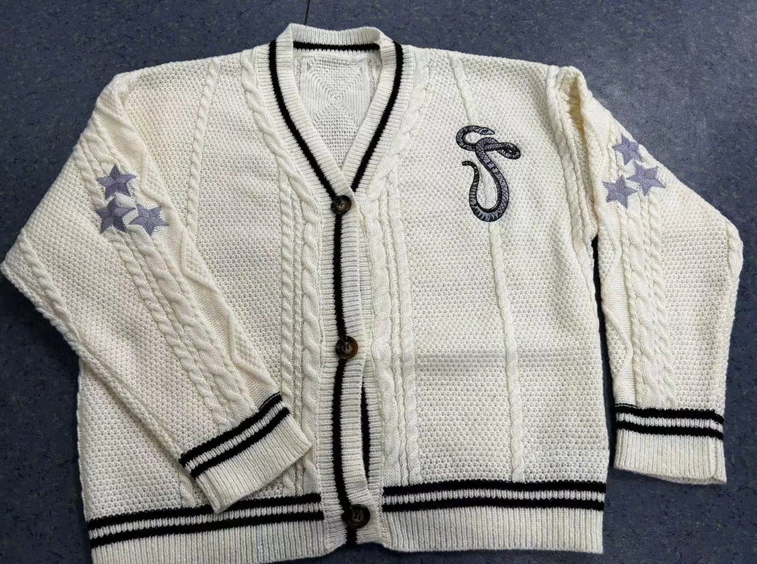 Ladies knitted college cardigan with cable pattern, V-neck, contrast stripes and embroidered appliqués Mune Fashion
