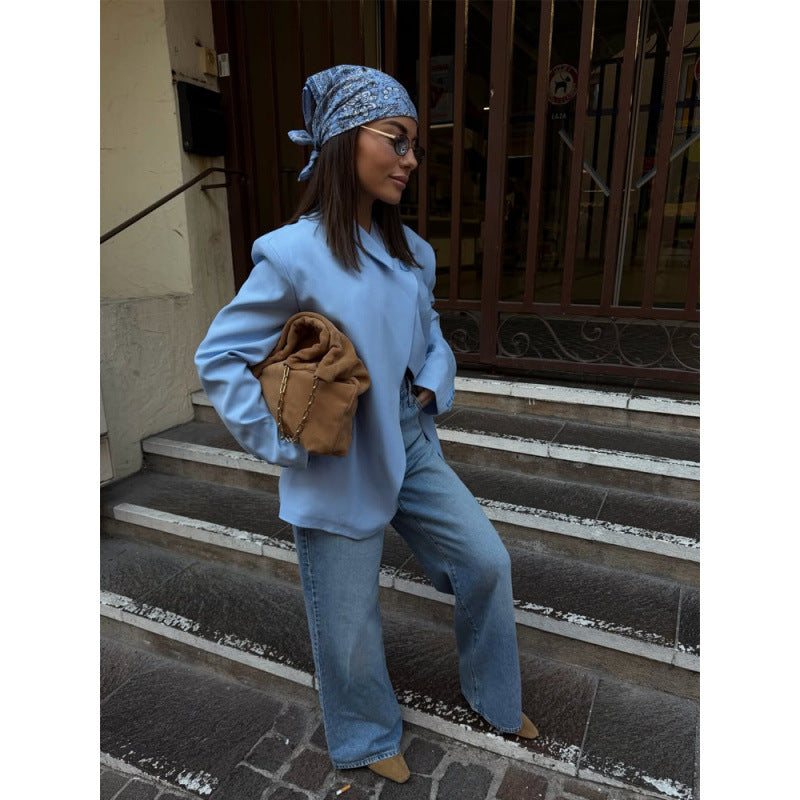 Women’s oversized long blazer with boxy silhouette, soft shoulders, and extended cut.