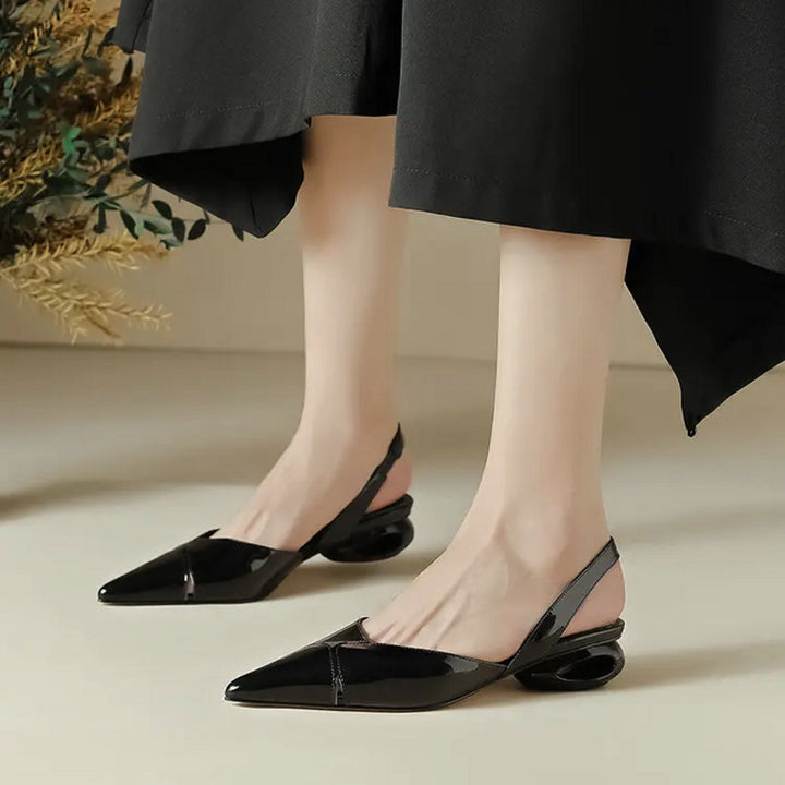 Women pointed toe slingback pumps with sculptural hollow heel Mune Fashion