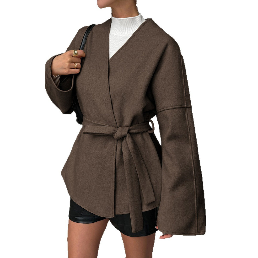Women’s light wrap coat with tie belt, dropped sleeves and feminine waist emphasis Mune Fashion