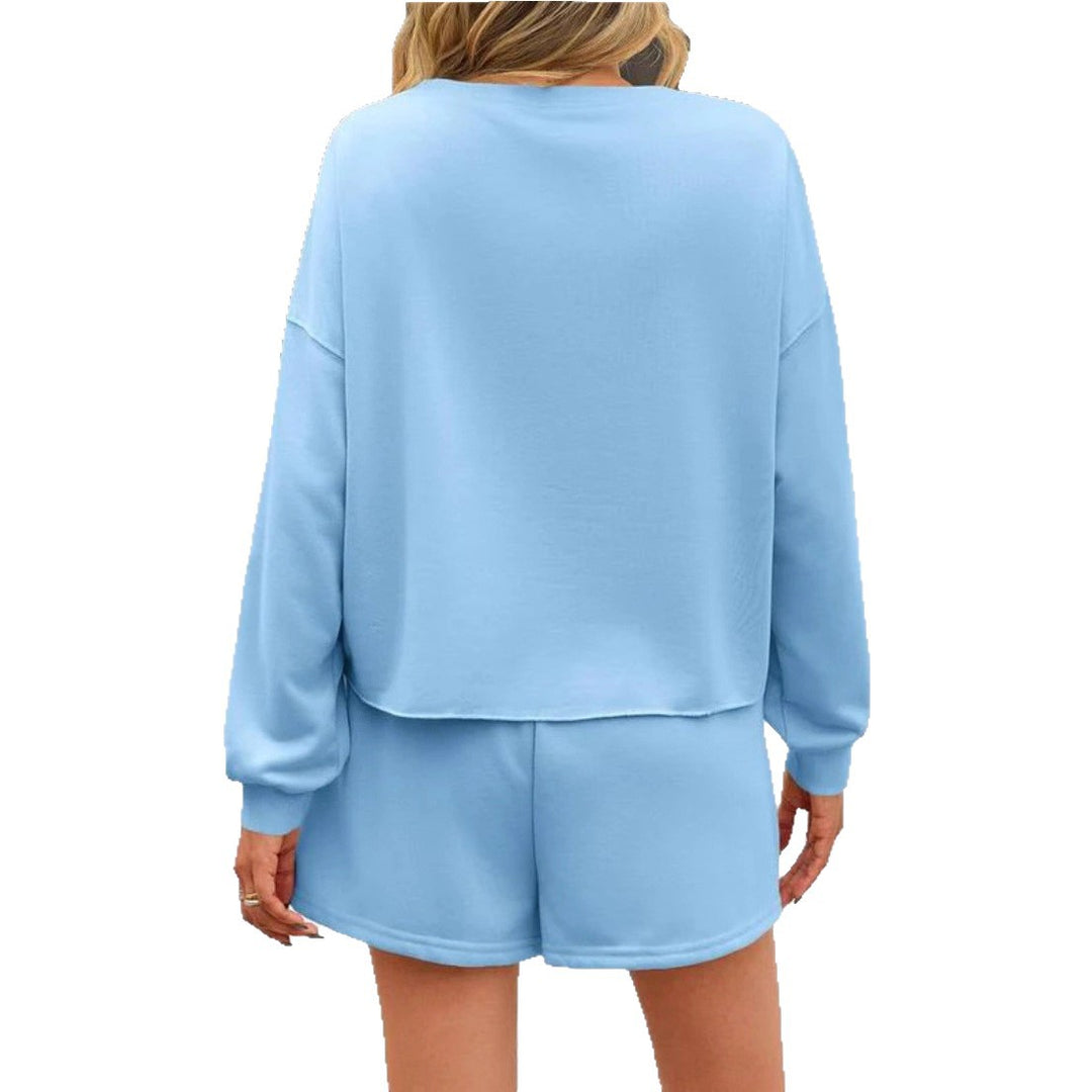 Ladies nan pearl-embellished sweat set with oversized sweater and flared mini skirt Mune Fashion